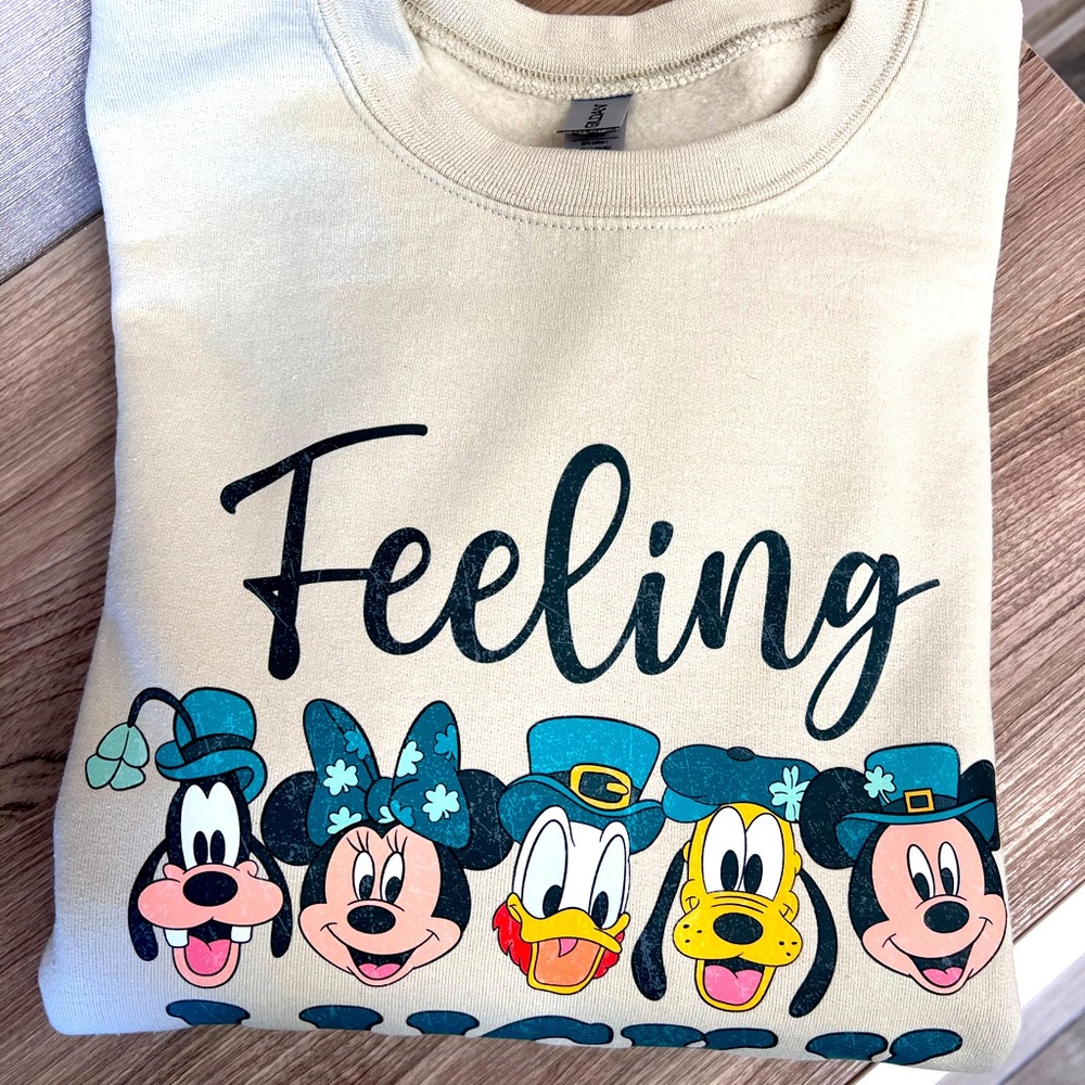 Sweatshirt-St. Patrick’s Day Disney print. 2 medium, 1 small. Unisex brand new.